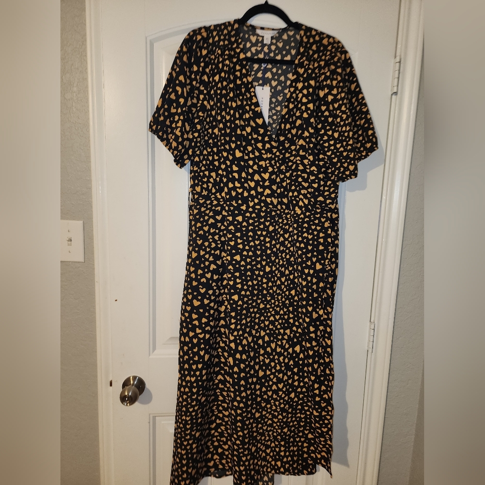 Ankle length black dress with yellow hearts on it